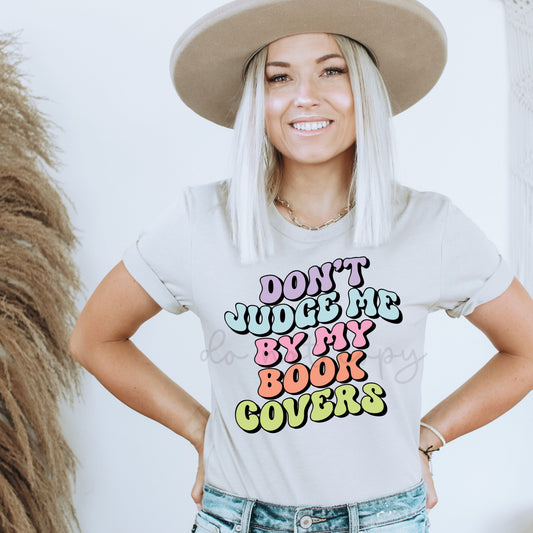 DON'T JUDGE ME BY MY BOOK COVERS - DTF TRANSFER