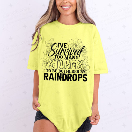 I'VE SURVIVED TOO MANY STORMS TO BE BOTHERED BY RAINDROPS - COMPLETED TEE